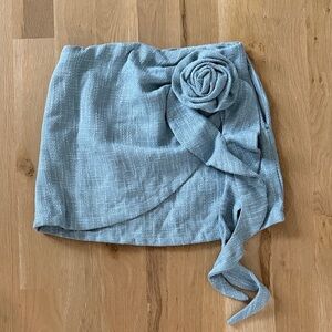Elegant Blue Textured Skirt with Floral Detail